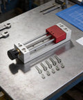CNC Vise For Drilling And Engraving Tools With Grooved PCB Fixing Table Aluminum Alloy Body Double Guide Rod Clamping System LTY 59100 Mini Vise Kit Ready To Mount On Drill Press CNC Machine Or Small Welding Fixture, red and silver
