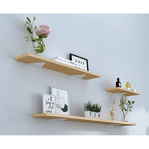 Built Like A Tank Hidden Floating Shelf Brackets 2 Or 4 Pack showcasing wooden shelves with plants and decor items.
