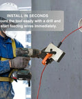 Compact Drill Powered Wire Puller Featuring Slick Conduit Fish Tape Grip in use with drill for easy wiring tasks.