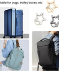 Star Shaped Stainless Steel Keychain Clip Carabiner with Snap Hook and Detachable Key Rings shown with suitcases and backpacks.