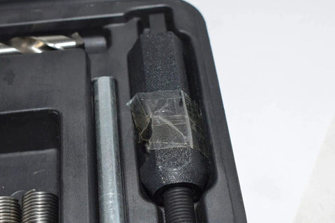 Close-up of Heavy Duty Thread Repair Kit With Drill Bit 304 Stainless Steel 7/16-20 UNF Inserts 18 Piece Set components in case