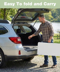 Man carrying 34 Inch Square Folding Table For Four With 330 Lbs Capacity Built Tough HDPE Top And Heavy Duty Steel Legs