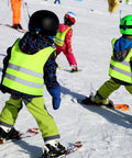 Kids High Visibility Safety Vests Bulk Pack Of 10 Neon Reflective Traffic Vests With Zippers For Ages 3 To 10 in use on snow