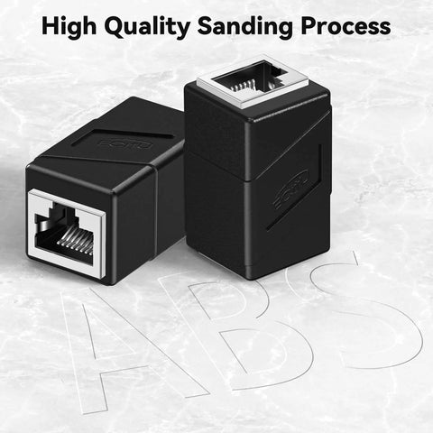 Two Pack Ethernet Couplers To Extend Your Cables Female To Female RJ45 Patch Cable Extenders 8P8C Straight Through Network Connectors Compatible With Cat5e Through Cat8 Cables Black on marble surface
