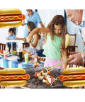 Family BBQ with kids using Six Pack Hot Dog Balloons Set For Food Theme Parties, Summer BBQs And Picnic Decor around the grill.