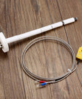 K-type kiln thermocouple probe with ceramic insulator and braided stainless-steel sheath, yellow two-pin connector