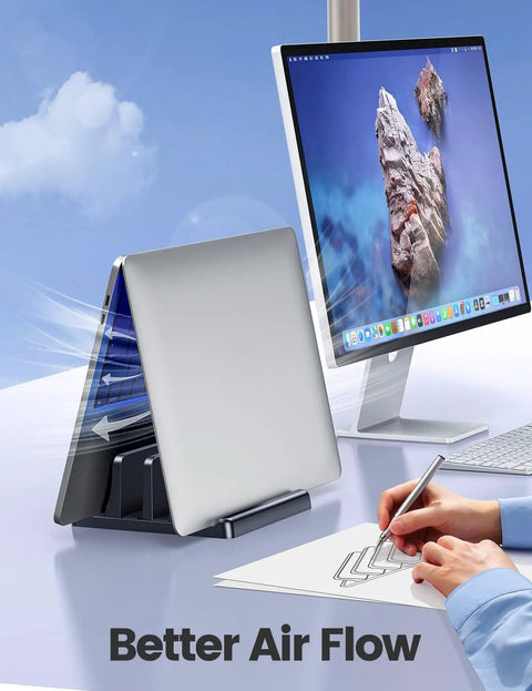 Vertical Laptop Stand For Desk With Dual Slots Space Saving 4 In 1 Design Adjustable Width Laptop Organizer shown holding laptop
