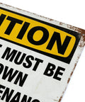 Close-up of Dope Vintage Metal Tin Sign 8x12 Inch Caution Equipment Must Be Shut Down Before Maintenance corner detail.