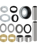 Components of Beefed-Up Swing Arm Bearing Seal Rebuild Kit For Yamaha Raptor 660R YFM660R 2001-2005 With Premium Seals And Bearings Includes 5LP-22184-00-00 5LP-22123-00-00 93106-22019-00 spread out, including bushings, seals, and bearings.