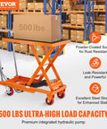 Heavy Duty Hydraulic Lift Table Cart With 500 Pound Capacity And 28.5 Inch Max Rise Built Tough As Nails for moving heavy boxes in a warehouse.
