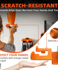 Heavy Duty Weedeater Wall Hanger Rack for Trimmers in use, orange coated steel, mounted on wall, shows person adjusting tool