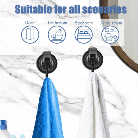 No Drill Wreath Cup Hook With Super Suction Hanger For Kitchen Bath And Restroom Black Plated Polished Finish 4 Pack Damage Free Mount Holds Up To 11 Pounds Easy Install Long Lasting Hold showing two hooks mounted on marble wall holding blue and white towels suitable for various rooms.