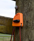 Electric Fence Cutout Switch For Quick Power Control In Outdoor Fencing Systems Pro Grade Rugged Build For Harsh Weather Easy Install mounted on wooden post