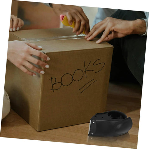 Rock Solid Heavy Duty Tape Dispenser Cutter With Ergonomic Grip and Sharp Steel Blade for 5 cm packing tape used to seal a box.