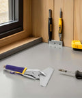Sheet Metal Hand Seamer Pliers with Straight Jaw and Ergonomic Non Slip Grip for HVAC Repairs on a workbench