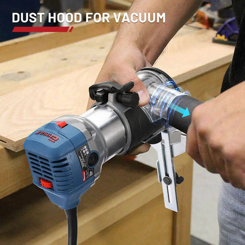 Person using Compact Wood Router Kit With 6.5 Amp 1.25 HP Power 32000 RPM Handy Beginner Friendly DIY Trim Router on wood surface.