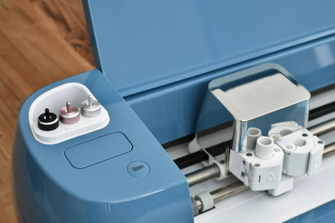 Tool Holder Insert For Cricut Explore Series Machines Not For Explore Air 3 installed on blue machine with tools placed inside