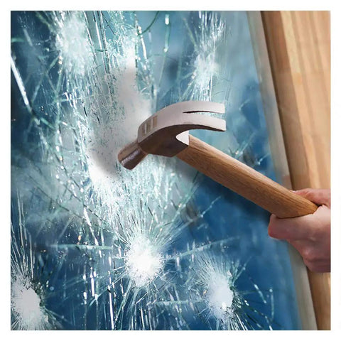 Clear self adhesive window film for home and office anti shatter safety glass shield with hammer impact on glass surface