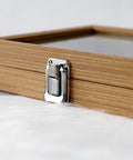 Close-up of Premium Solid Wood Stackable Jewelry Tray featuring a secure clasp and wooden finish for elegant storage.