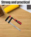 Heavy Duty 6 Inch F Clamp With Quick Adjustment And Antirust Finish For Welding Projects and Workshop Environments Featuring One Hand Operation, on a wooden surface.