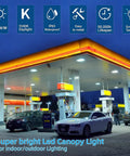 Gas station illuminated by High Bright LED Canopy Light Fixture 70W Replaces 500W HID Low Profile 5850 Lumens 5700K Cool White IP65