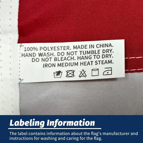 Label on Patriotic 2x3 Ft USA Flag Crafted From Oxford Polyester with care instructions and material details.