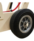 Close-up of a durable rubber wheel on the Rugged No Fuss 18 Inch Electric Walk Behind Saw for better mobility.