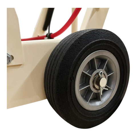Close-up of a durable rubber wheel on the Rugged No Fuss 18 Inch Electric Walk Behind Saw for better mobility.