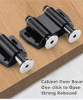 Black push latch set on wood surface, two-pack for cabinets and wardrobes, easy install, spring-loaded, quiet door catch.