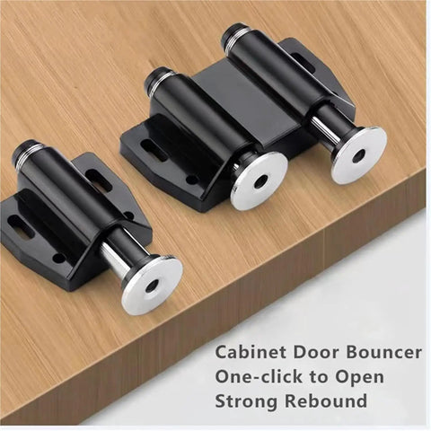 Black push latch set on wood surface, two-pack for cabinets and wardrobes, easy install, spring-loaded, quiet door catch.