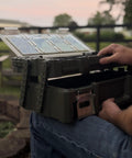 Man holding olive green cantilever tool box organizer with 18 removable bins for easy hardware storage and clear lid
