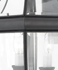 Close-up of the Newbury 20 Inch Outdoor Wall Lantern Two-Light Mystic Black With Clear Beveled Glass showcasing E12 bulb details