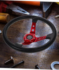 Dope 14 Inch PU Racing Steering Wheel For Cars Golf Carts And Trucks, Ergonomic Grip, Red Finish With Horn Button on table