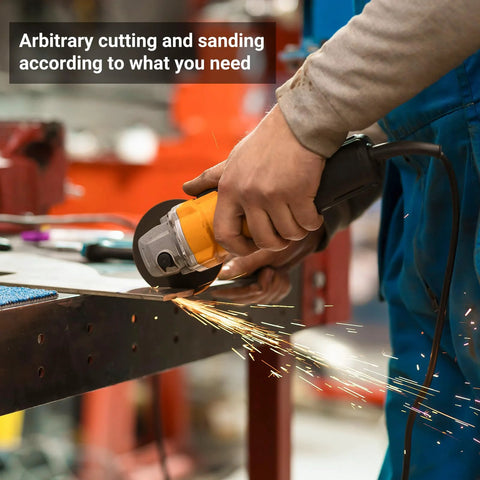 Stainless steel flat bar being cut with an angle grinder in a workshop; sparks fly.