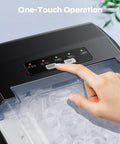Close-up of sleek black Countertop Ice Maker That Keeps It Cool With 9 Bullet Ice Cubes In 6 Minutes Up To 26 Lbs Per Day Two Ice Sizes