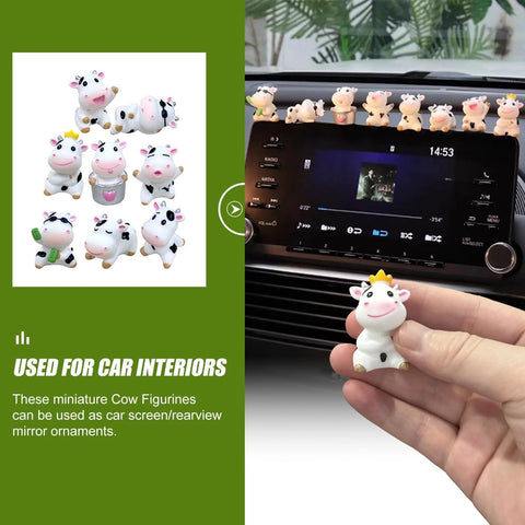 8-piece cow car dashboard ornament set; white plastic cow figurines for car interior, shown on dashboard and in hand