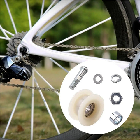 Slick Ride Bike Chain Tensioner Pulley Roller For Smooth Gear Shift And Reliable Driving Keep Your Chain Tight Super Quiet Plus Easy To Install Great Spare Part Upgrade For Your Daily Ride Kit on rear bike wheel, with white nylon rollers and mounting hardware