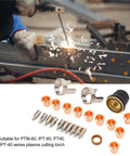 Fabater 24 Piece Plasma Cutting Torch Tip Kit With Electrodes Nozzles Stand Off Swirl Rings For PT-60 PTM-60 IPT-40 Cutters Brass Zinc Alloy parts laid out with sparks from cutting.