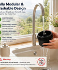 A person rinsing the Chill Cordless Coffee Grinder With 38 Adjustable Settings under running water in a kitchen sink.