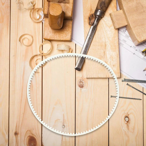 Tough As Nails Rubber Drive Belts Pack Of Four For Heavy Duty Industrial Sealers on a wooden workbench with tools.