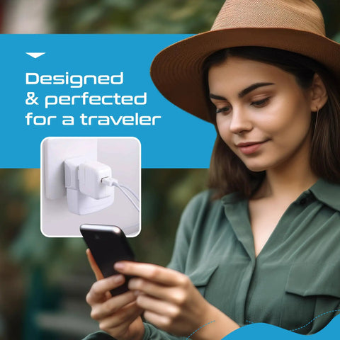 Young woman holding phone with World Travel Adapter Kit 11 Pack 2 In 1 Grounded Power Adapter plugged in wall socket.