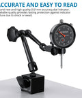 Black dial indicator with magnetic base for home shop use 0 to 1 inch range 0.001 inch readout, adjustable arm, and fine adjustment knob.