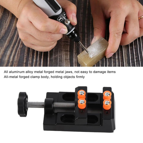 Heavy Duty Aluminum Alloy Milling Vise With Fixed Curve Grooves securing a carving piece with a drill.