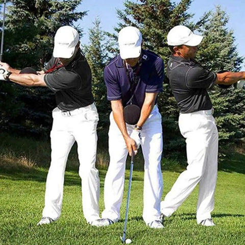 Golfers using Swing Posture Trainer For Golf With Inflatable Practice Ball Portable Golf Swing Aid on grassy course.