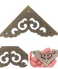 Metal Corner Protectors Set 12 Ornate Edge Guards Made Of Zinc Alloy Old School Vintage Look held in hand