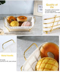 Gold Wire Serving Basket For Fruit And Bread with linen lining containing assorted buns