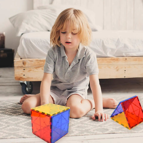 Child playing with 12 Piece Large Magnetic Tiles Set For Kids Jumbo 5.9 Inch Magnetic Base Plates STEM Building Blocks