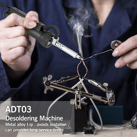 Person using Electric Desoldering Pump For PCBs And Electronics Repair 110V 30W Automatic Solder Sucker on circuit board