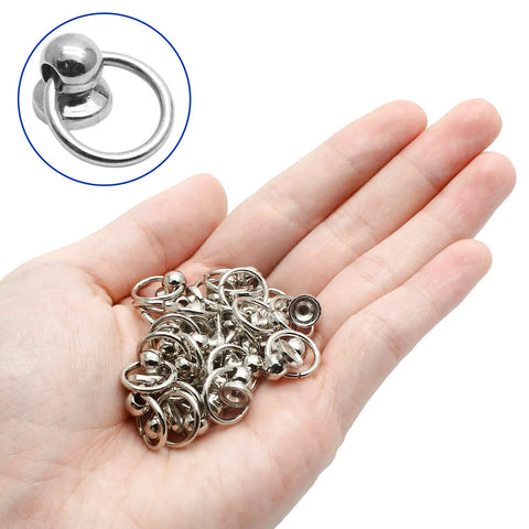 Rock Solid 60 Pack 8mm Screwback Round Head Rivets With Compact Install Screwdriver Tough As Nails Zinc Alloy Silver Fasteners That Lock Down Tight For Garage Grind And Craft Jobs Bang For Your Buck, hand holding shiny silver round head rivets.
