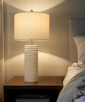 24 Inch Farmhouse Ceramic Table Lamp Set Of 2 White For Bedroom And Living Room Modern Nightstand Lamps, lit beside bed.